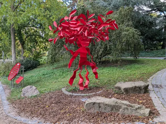 Red sculpture, photographed with the Google Pixel 10a