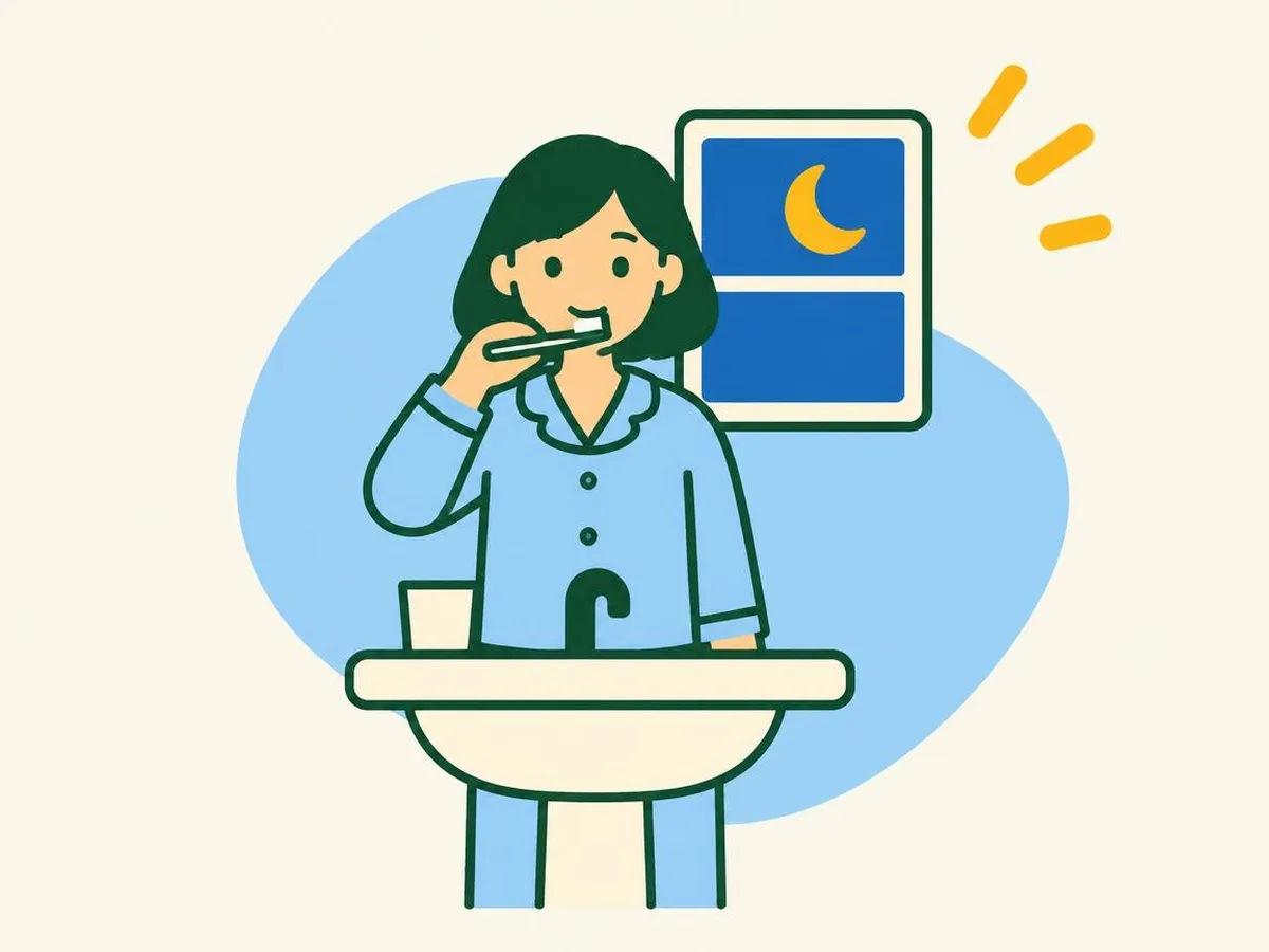 Illustration of a woman in pyjamas brushing her teeth at the basin, with a dark window showing a crescent moon