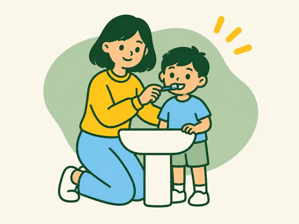 Illustration of a woman kneeling beside a young boy at the basin, helping him brush his teeth