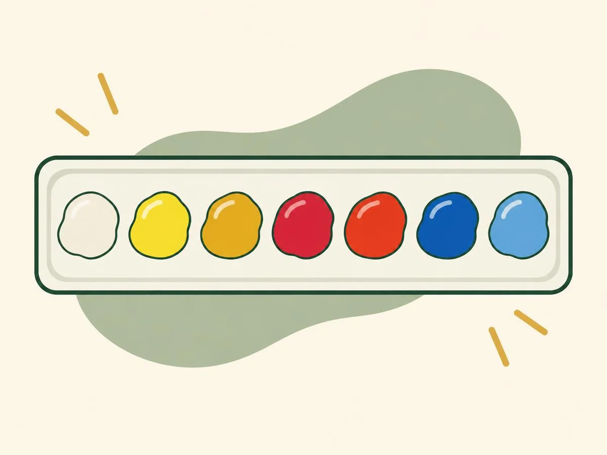 Illustration of a white palette with a blob of white and six blobs of paint in a row: two yellows, two reds and two blues