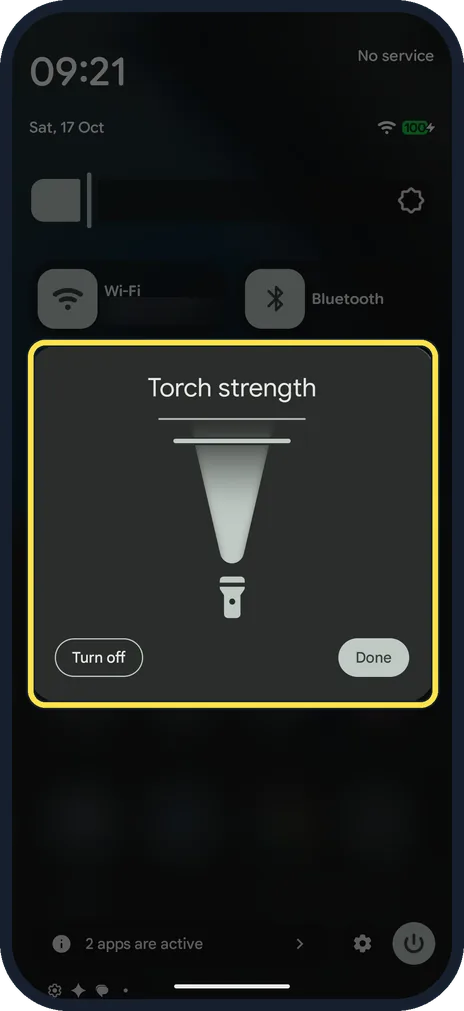 Android screenshot: Touch and hold the torch tile