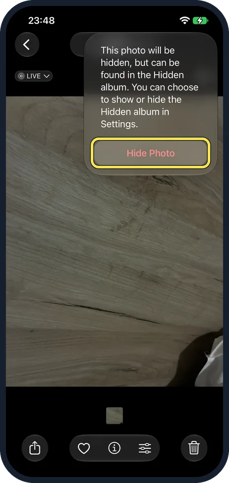 iPhone screen: Tap Hide Photo