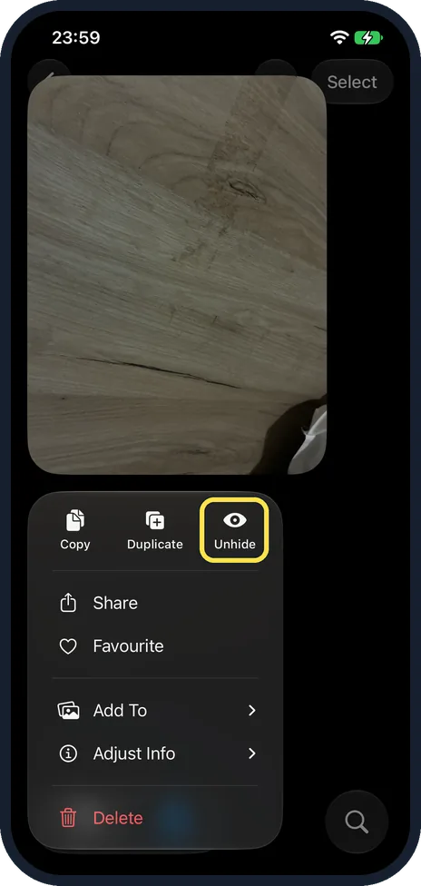 iPhone screen: Unhide a photo