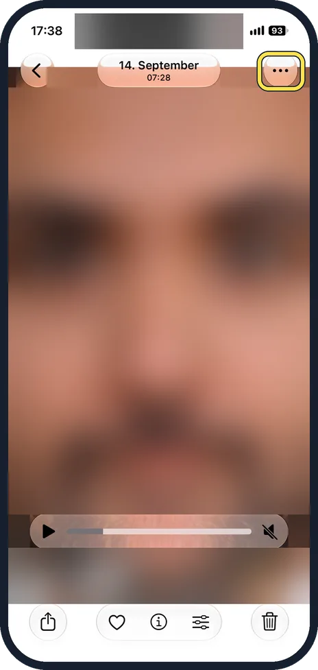 iPhone screen: Tap the three dots
