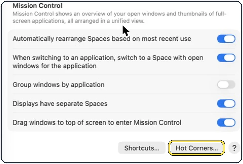 Part of the Mac System Settings window: Scroll to the bottom and click Hot Corners