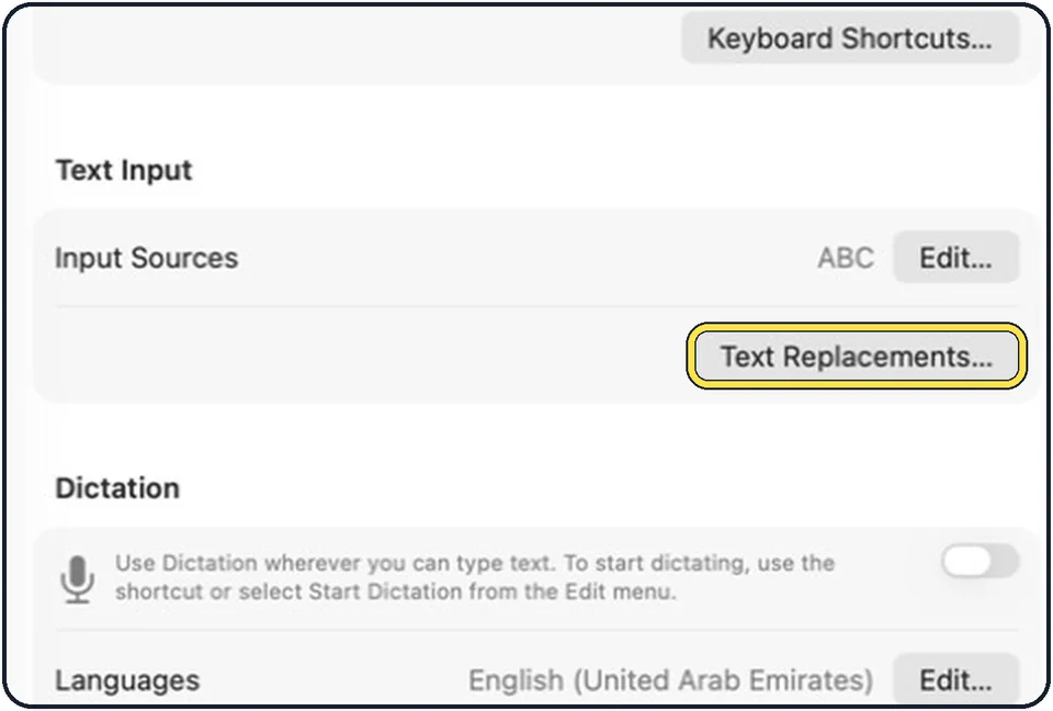 Part of the Mac System Settings window: Click Text Replacements