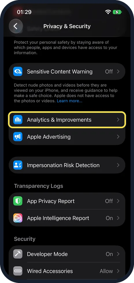 iPhone screen: Scroll down and tap Analytics & Improvements