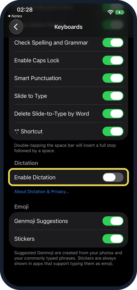 iPhone screen: Scroll down and switch off Enable Dictation
