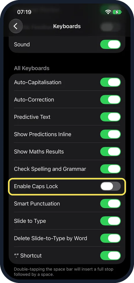 iPhone screen: Scroll down to Enable Caps Lock