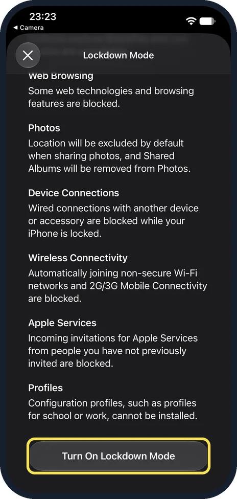 iPhone screen: Tap Turn On Lockdown Mode, then Turn On & Restart