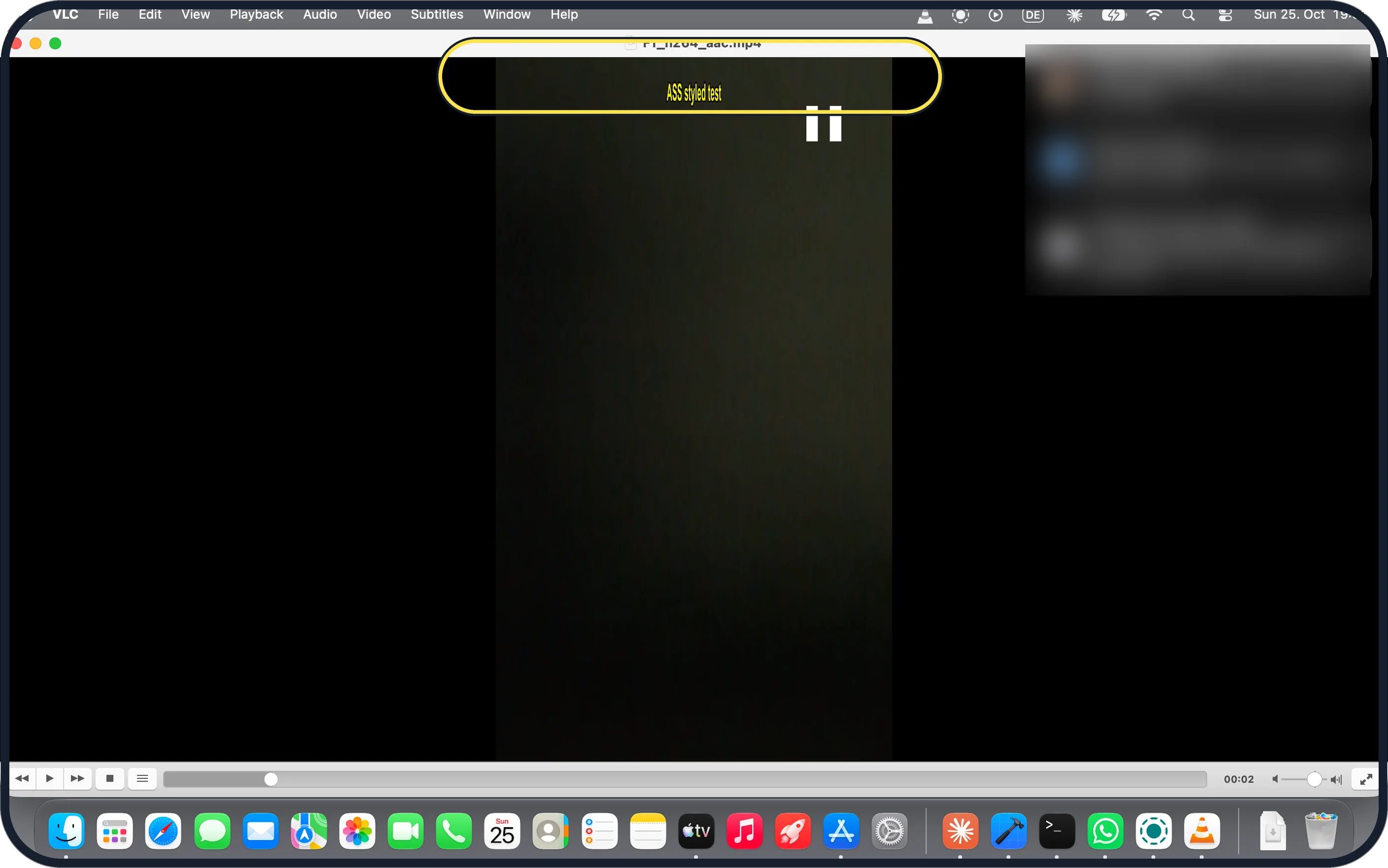 Mac screenshot: yellow ASS subtitle at the top